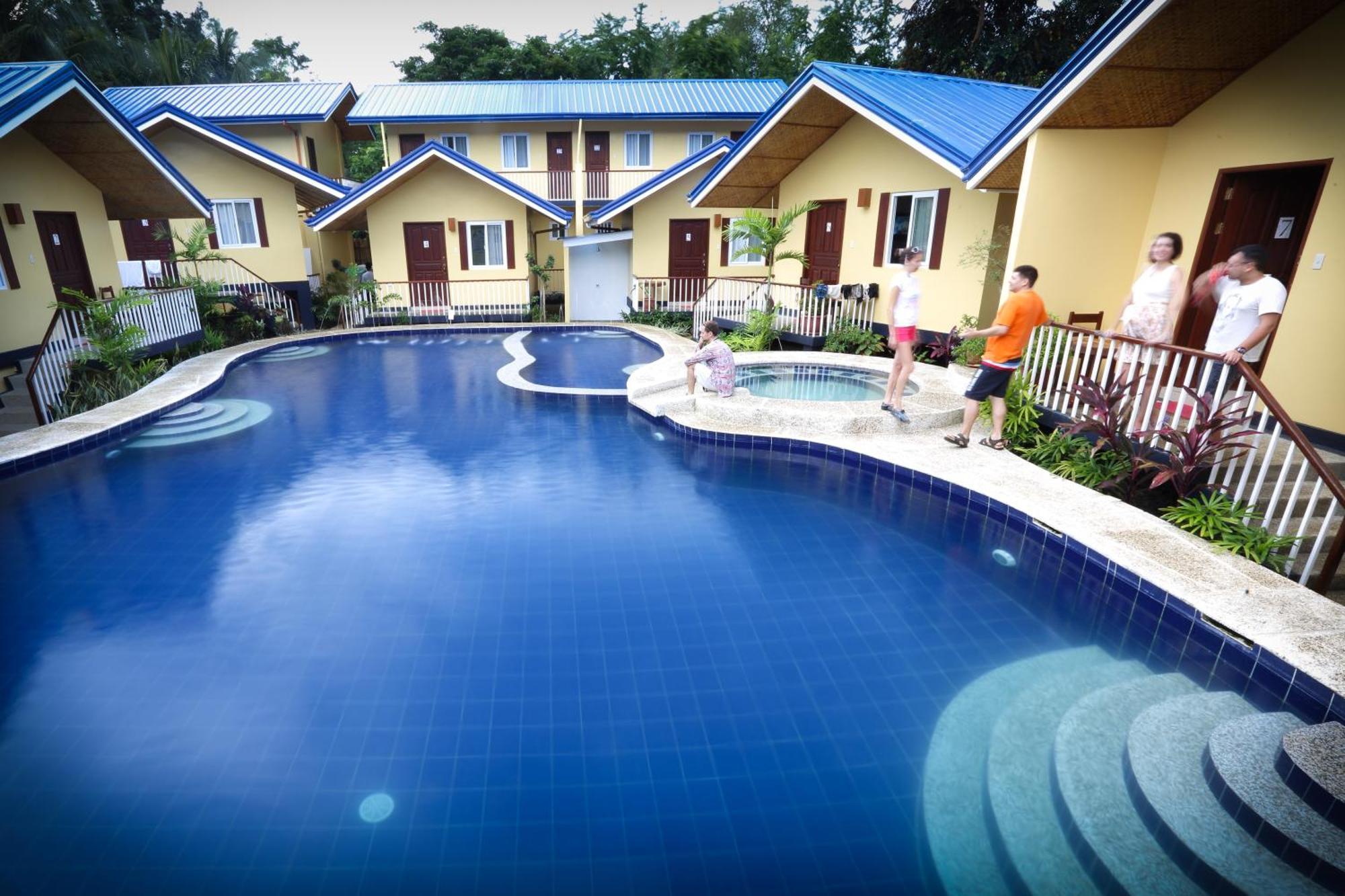 Blue Lagoon Inn & Suites Puerto Princesa Exterior photo